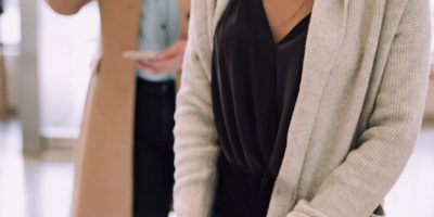 woman using white device